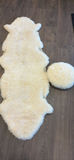Sheepskin Rug and Round Cushion - thumbnail 1 of 10