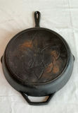 Cast iron cookware set with Lodge skillets, Lodge Dutch oven, and Griswold ash tray - thumbnail 5 of 9