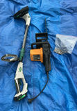 Scott’s Battery Powered String Trimmer And Poulan 18 “ Electric Chainsaw - thumbnail 1 of 7