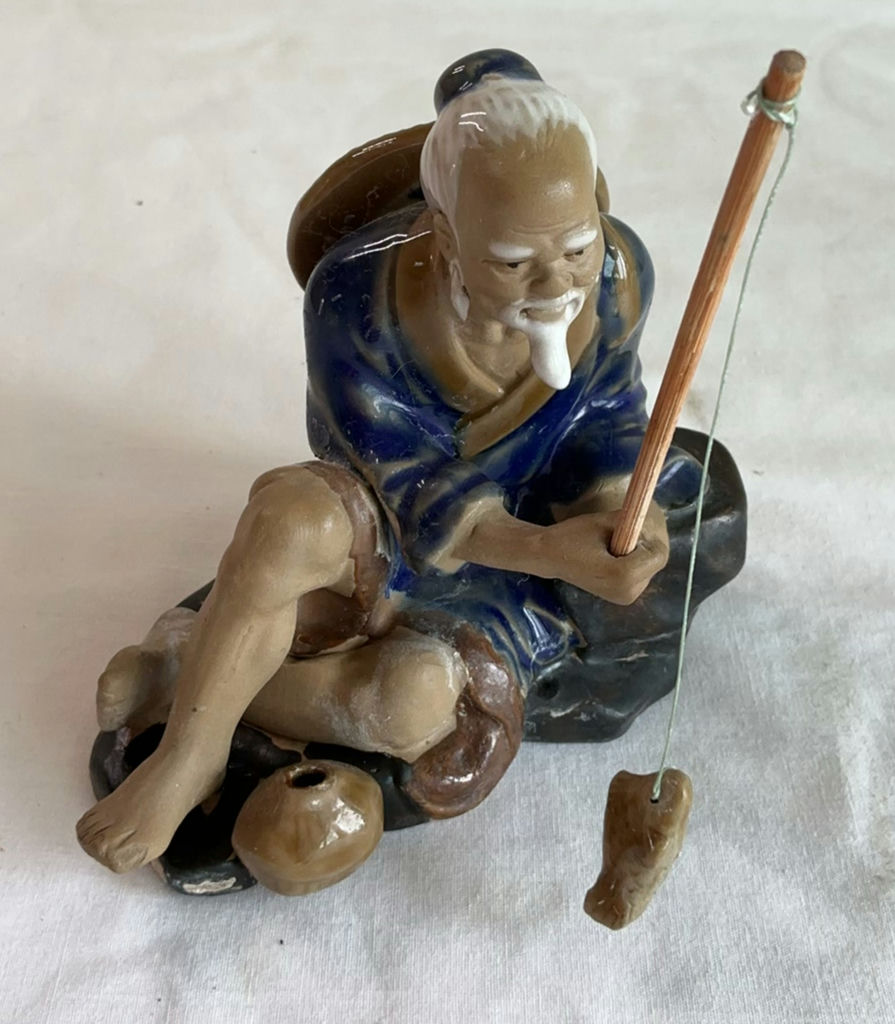 Cast Iron Leaf Stand And Small Asian Figurines - image 4 of 7