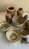 Collection of earth toned pottery - thumbnail 1 of 11