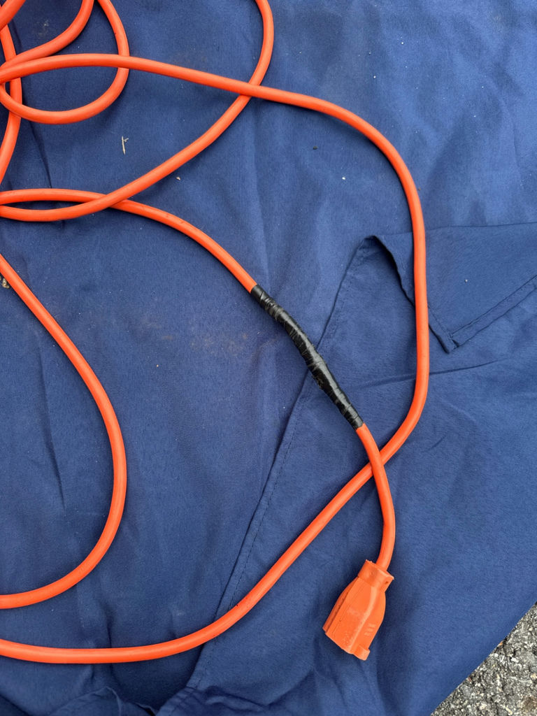  orange extension cord - image 3 of 3