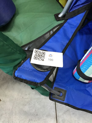 Blue Folding Camping Chair with Rolled Mats - Image 1 of 3