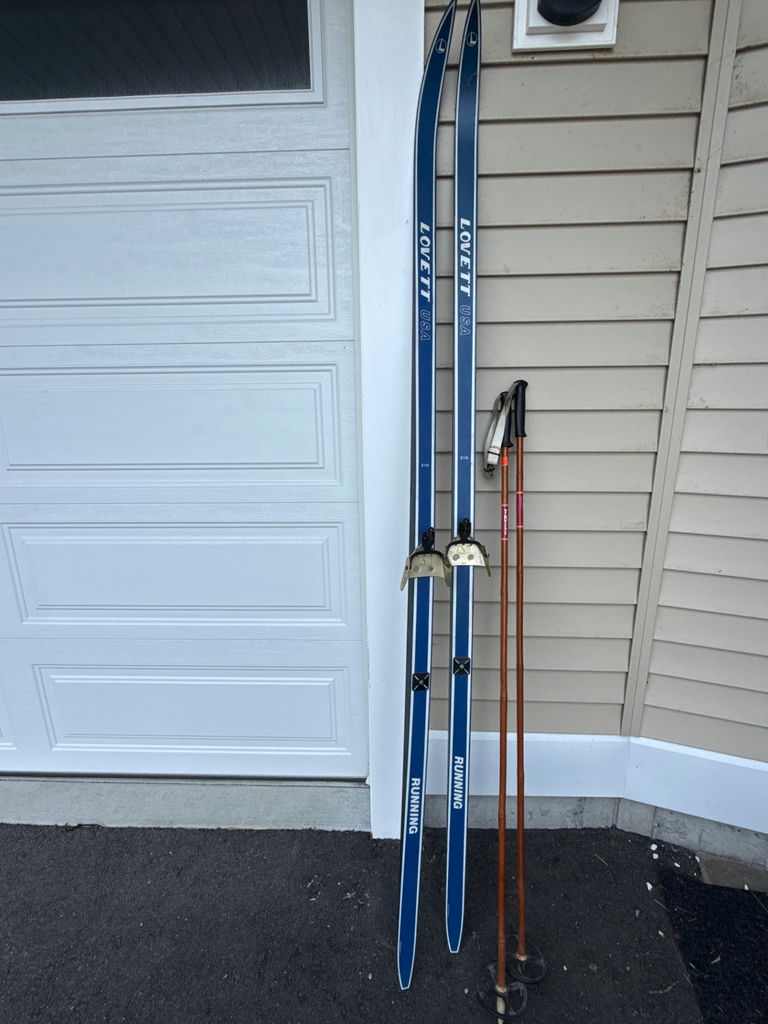 Pair of Lovett USA blue cross-country skis with poles - image 1 of 5
