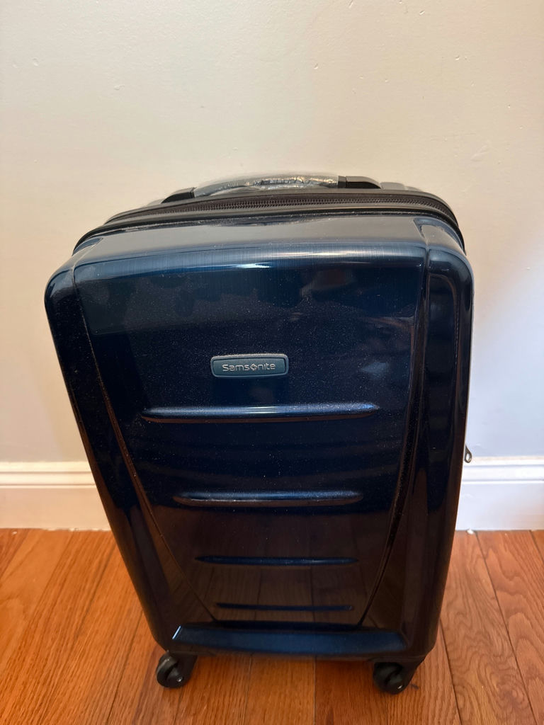 Blue Samsonite hard-shell rolling suitcase - image 2 of 5