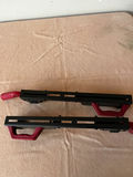Pair of black plastic bar clamps with red handles - thumbnail 3 of 3