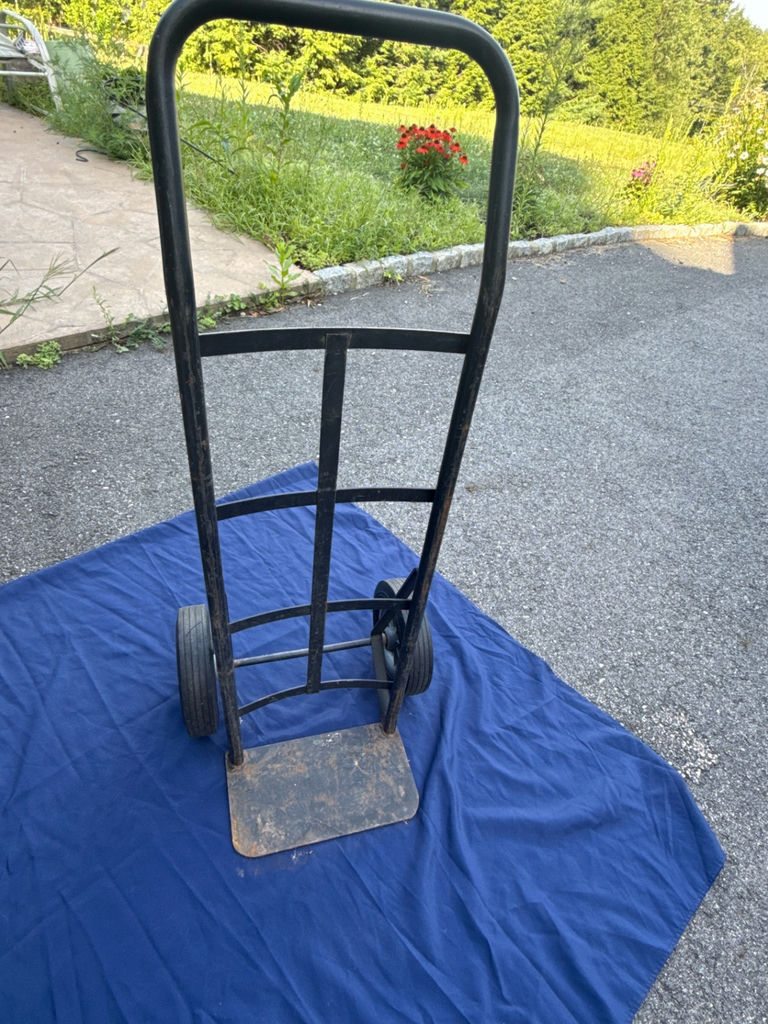 Two-wheeled black hand truck with base plate - image 1 of 2