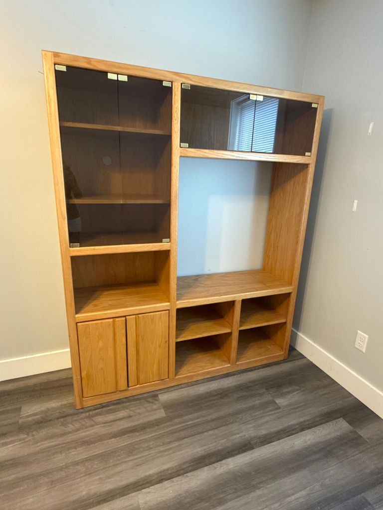 Wooden modular storage cabinet with glass-front display - image 1 of 2