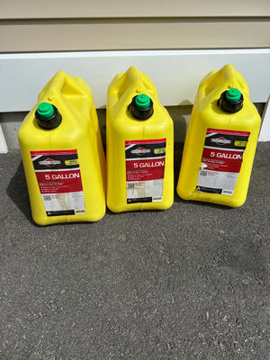 Three yellow 5-gallon diesel fuel containers - Image 1 of 2