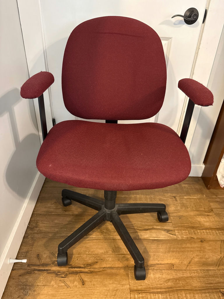 Red fabric office chair with armrests - image 1 of 3