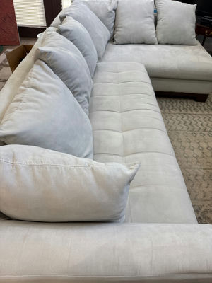 Light gray sectional sofa with chaise and cushions - Image 1 of 4
