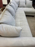 Light gray sectional sofa with chaise and cushions - thumbnail 1 of 4