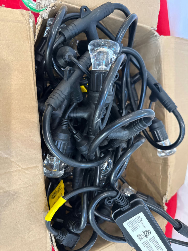 Box of string lights with power adapter - image 1 of 2
