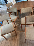 Round wooden dining table with upholstered chairs - thumbnail 2 of 8