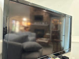 Sharp AQUOS flat-screen TV with remotes and media discs - thumbnail 2 of 4