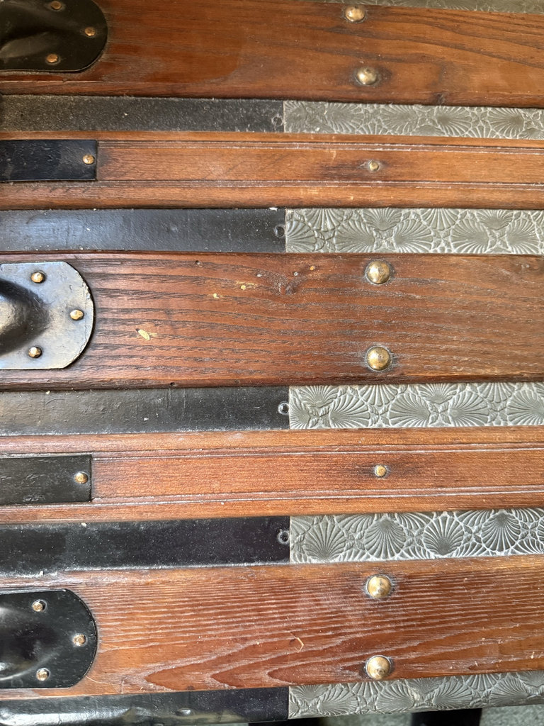 Antique wooden steamer trunk with embossed metal panels - image 2 of 7