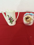 Vintage ceramic teapot and face-shaped decorative planter - thumbnail 1 of 10