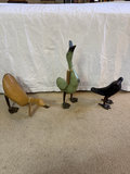 Three wooden bird sculptures: two ducks and a raven - thumbnail 1 of 11