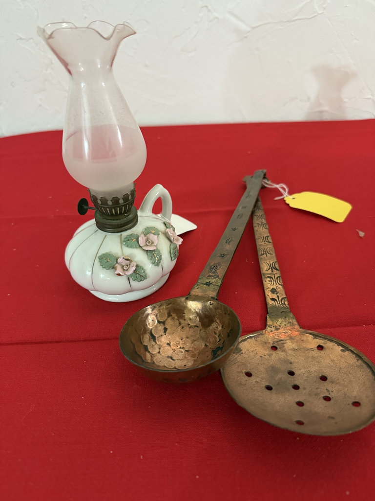 Floral ceramic oil lamp with pink chimney and two long-handled metal kitchen utensils - image 1 of 6