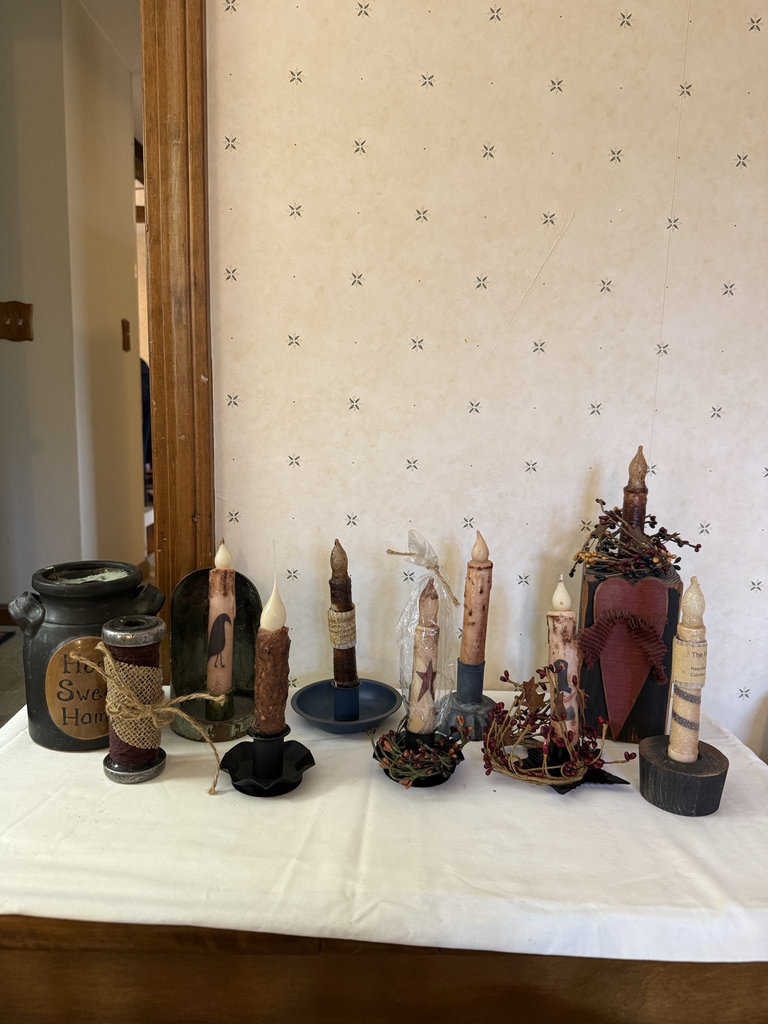 Assorted battery-operated candles with holders and decorative accents - image 1 of 6