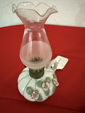 Floral ceramic oil lamp with pink chimney and two long-handled metal kitchen utensils - thumbnail 2 of 6