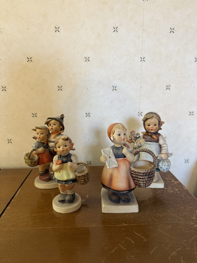 Hummel figurine set: Meditation, Sister, Surprise, and Weary Wanderer - image 1 of 11