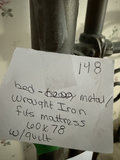 Wrought iron bed with quilted bedding - thumbnail 6 of 7