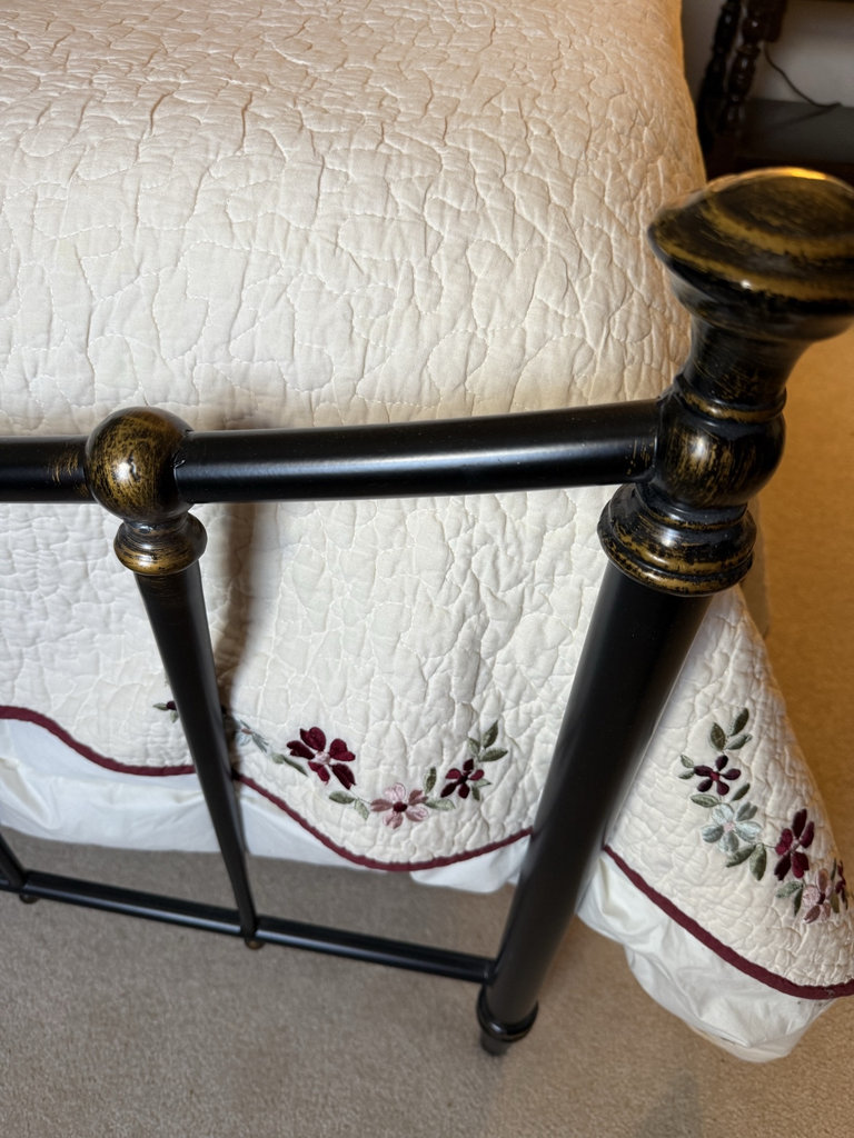 Metal bed frame with quilted floral quilt and bedside tables - image 2 of 6