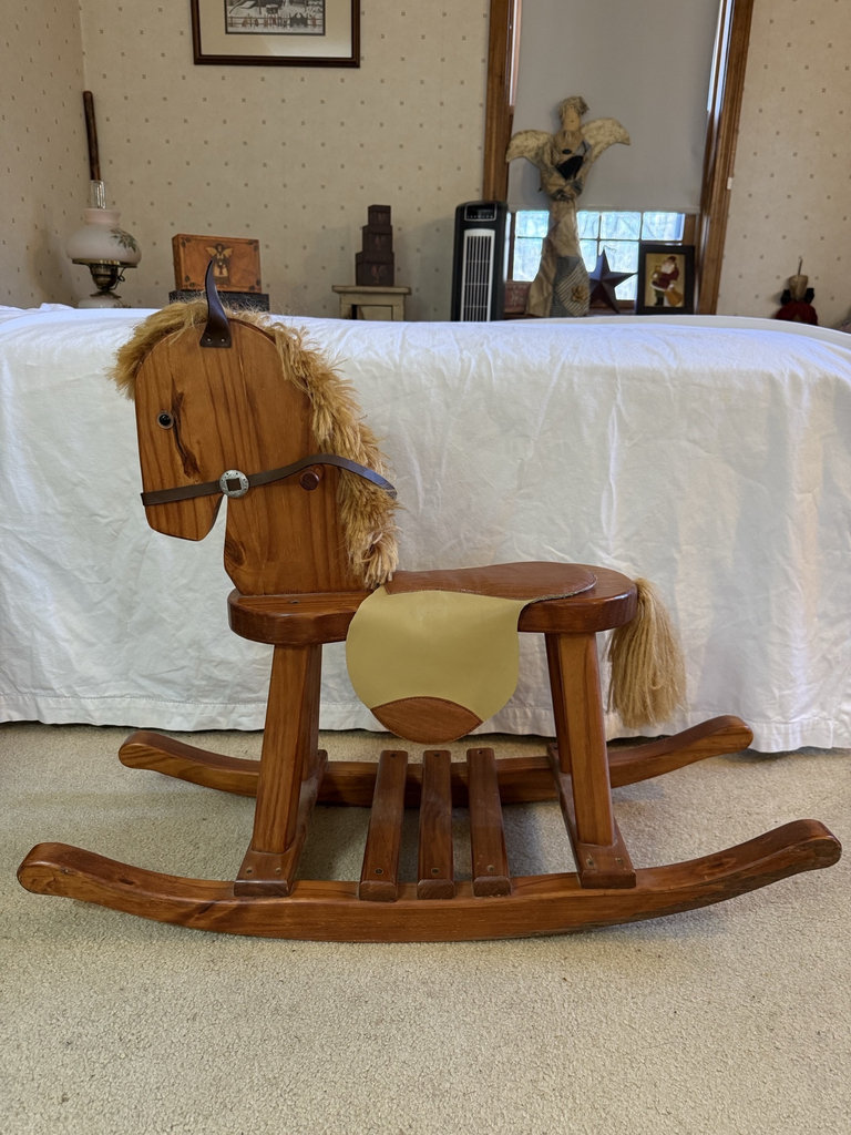 Wooden rocking horse with fur mane and saddle - image 1 of 7