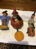 Three wooden Halloween decorations and a stained glass pumpkin - thumbnail 1 of 3