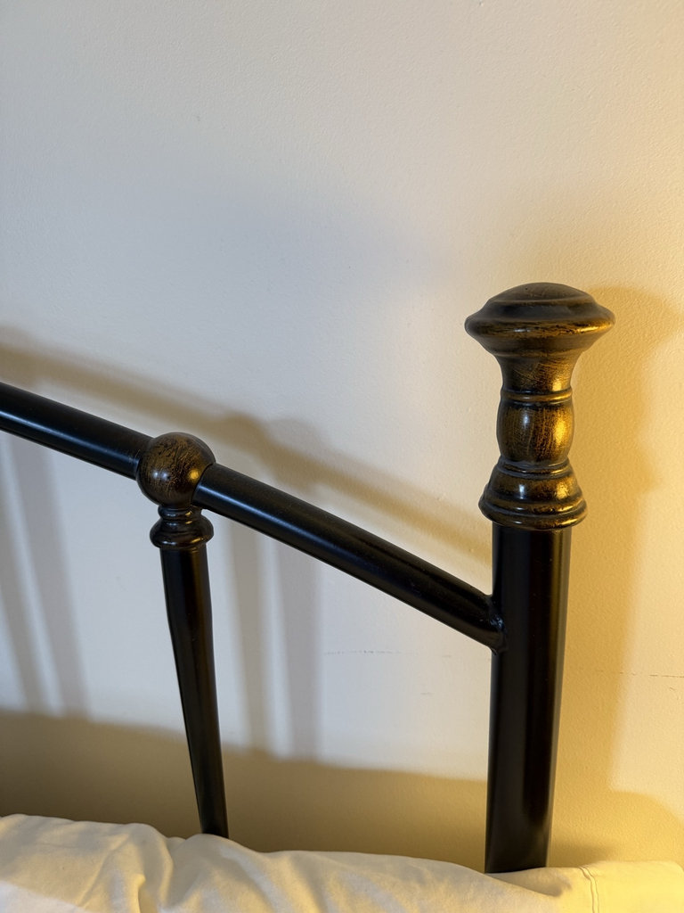Metal bed frame with quilted floral quilt and bedside tables - image 3 of 6