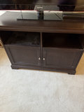 Dark wood entertainment console with Samsung TV - thumbnail 1 of 7
