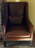 Brown Leather Wingback Armchair with Pillow - thumbnail 1 of 7