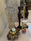 Glass Vase, Candle Holders, and Religious Prayer Candle - thumbnail 1 of 5