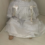 Porcelain Doll, Woven Basket, Vase, and Framed Angel Print - thumbnail 7 of 9