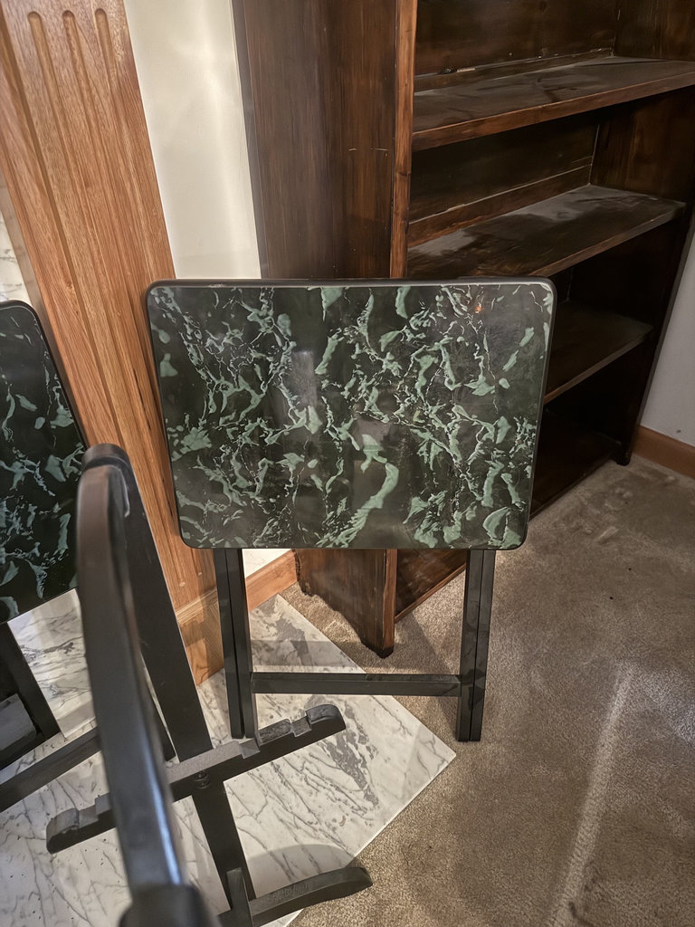 Black metal folding tables with green marble-pattern laminate tops - image 3 of 8