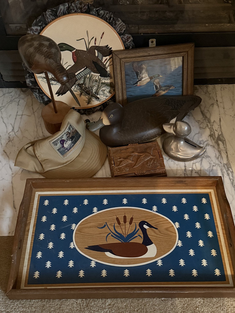 Duck-themed decorative collection with carved decoys, metal bank, and framed art - image 1 of 20