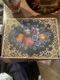 Floral decorative tins, a ceramic vase with fabric roses, and a decorative plate with a vintage photo - thumbnail 2 of 6