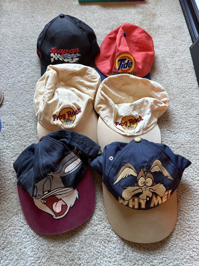 Six baseball caps with racing logos and cartoon graphics - image 1 of 5