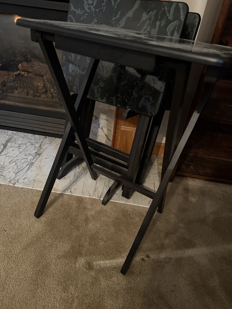Black metal folding tables with green marble-pattern laminate tops - image 7 of 8