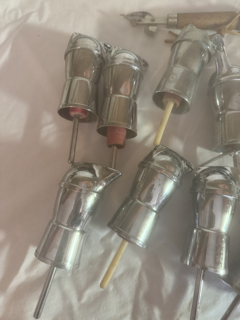 Set of small metal cylindrical components with rods - image 2 of 3