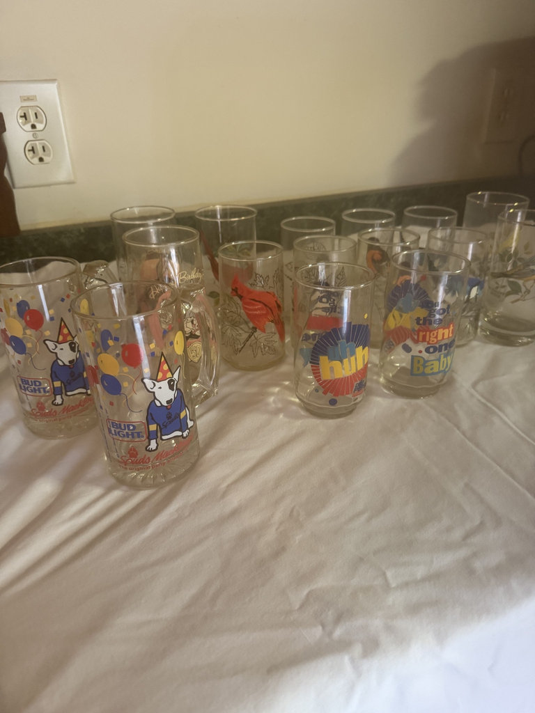 Sixteen vintage glass beer mugs with animal designs and Bud Light branding - image 1 of 9