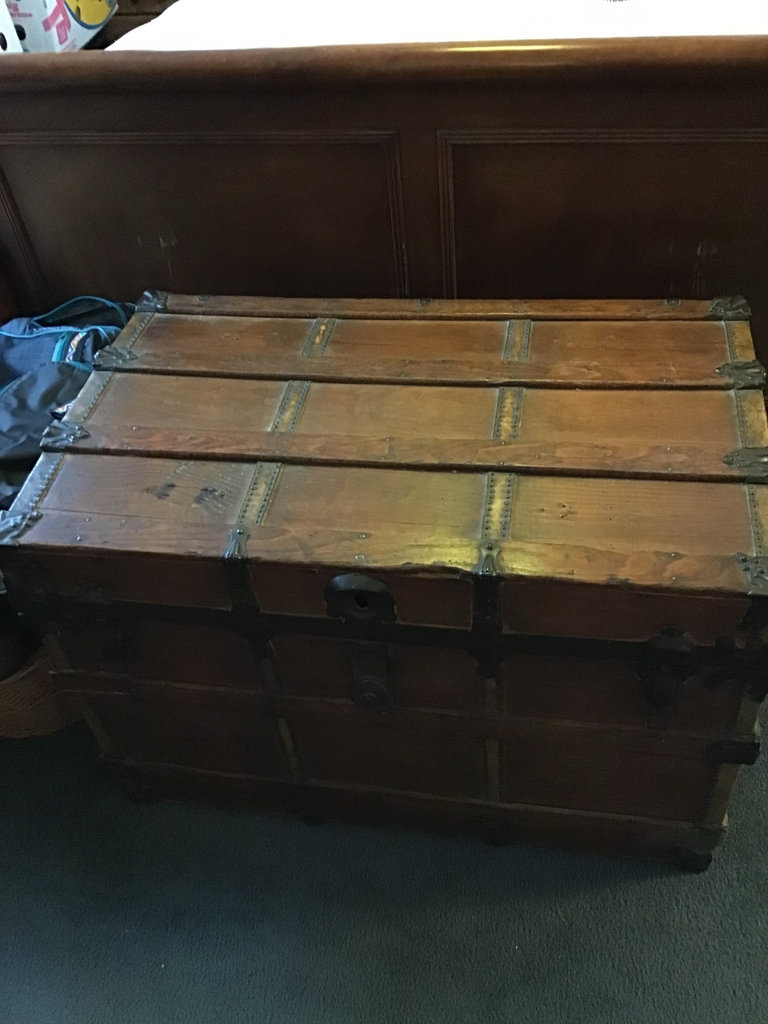 Antique wooden trunk with metal hardware - image 1 of 4