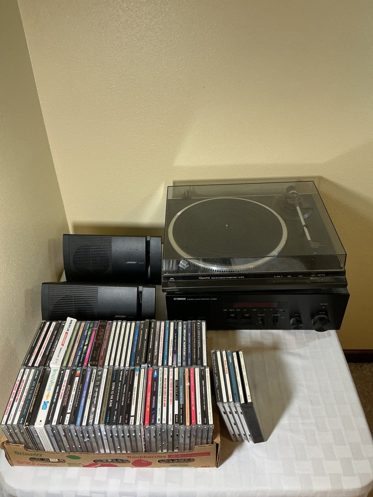 Technics turntable with Yamaha receiver, Bose speakers, and CD collection - image 1 of 8