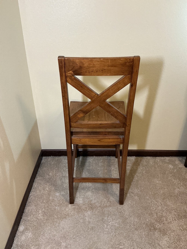 Wooden X-back chair with a marble like table - image 4 of 6