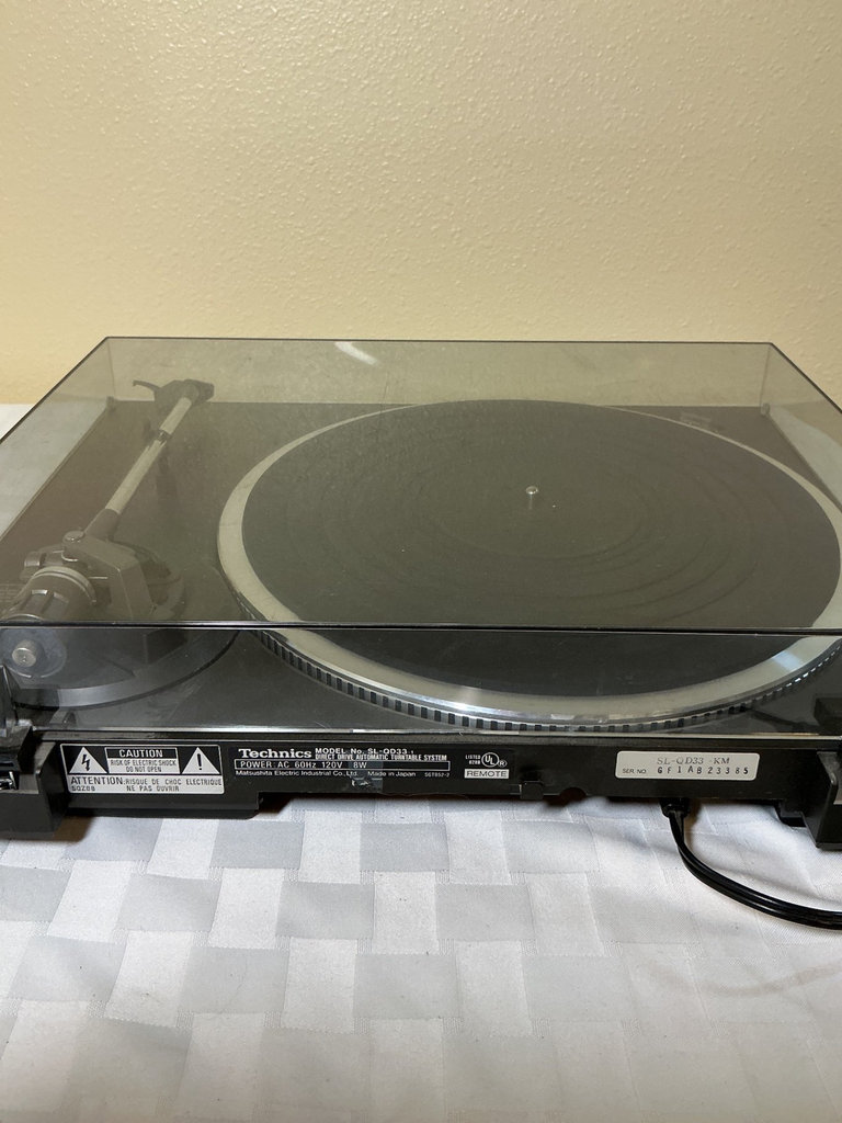 Technics turntable with Yamaha receiver, Bose speakers, and CD collection - image 3 of 8