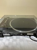 Technics turntable with Yamaha receiver, Bose speakers, and CD collection - thumbnail 3 of 8
