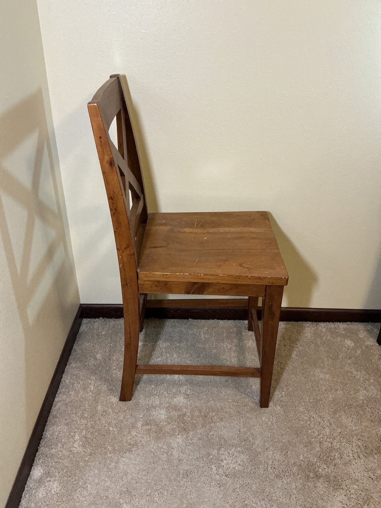 Wooden X-back chair with a marble like table - image 5 of 6