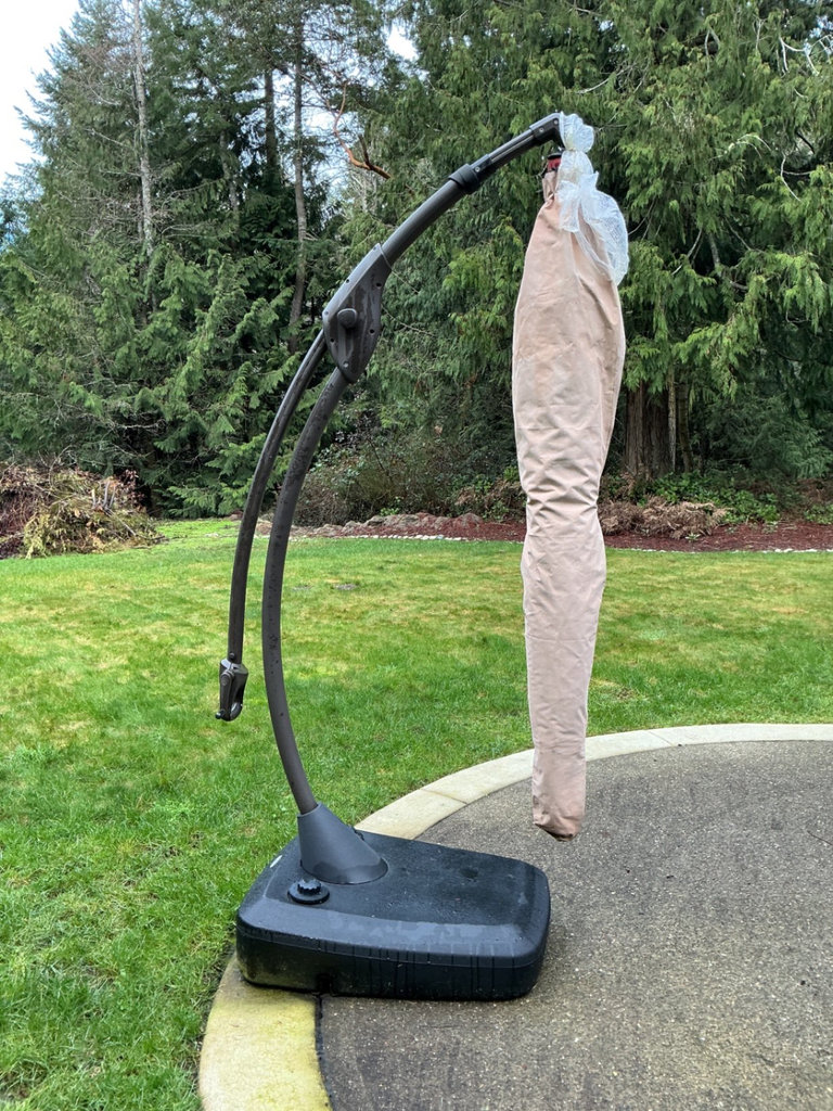 Large Red cantilever patio umbrella with base and protective sleeve - image 5 of 6