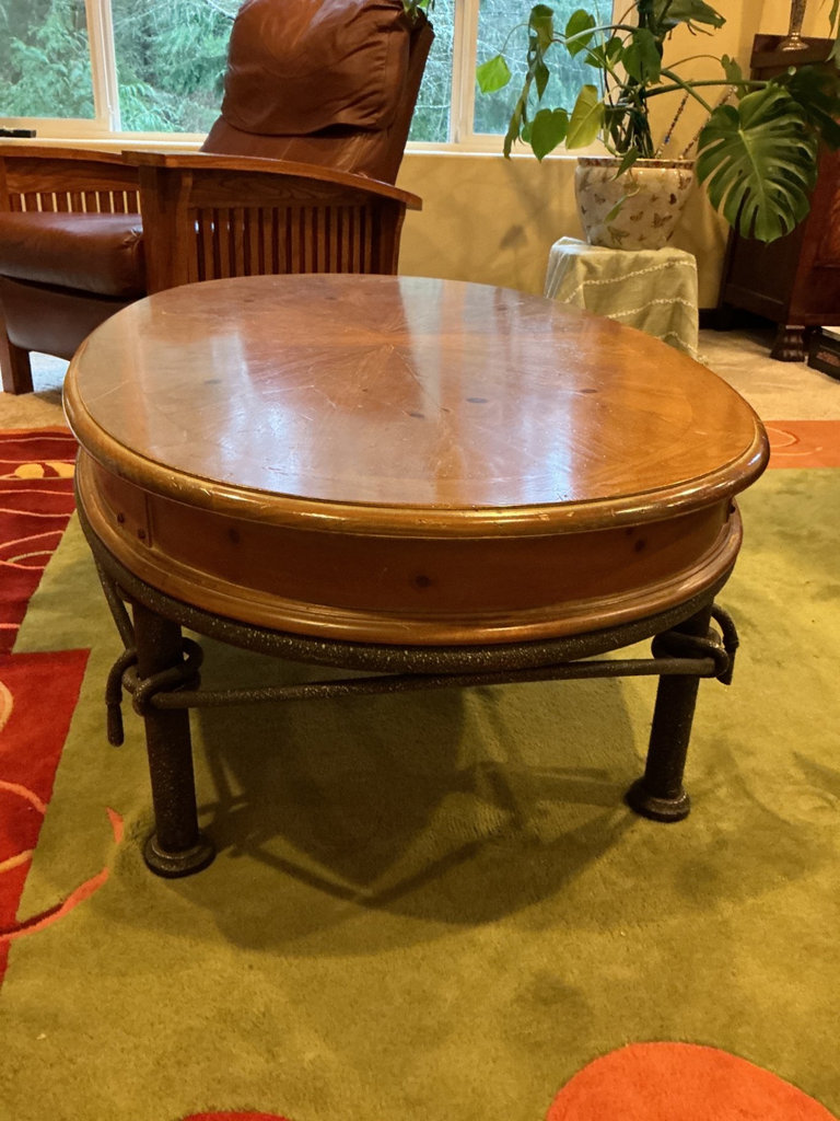 Oval wooden coffee table with metal base - image 3 of 4